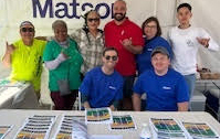 image of volunteers at Info Station